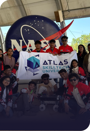 students at NASA Rover Challenge with Atlas SkillTech University team and rover model