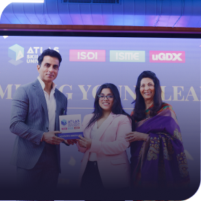 Angel Manthanam receiving promising young leader award with dignitaries