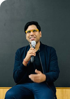 speaker holding microphone during talk or presentation session