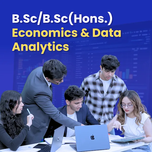 BSc Economics and Data Analytics student working on laptop analyzing data and coding for economic insights