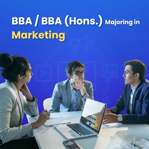 BBA and BBA Hons Marketing students discussing strategies in a business meeting with laptop