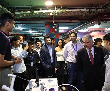 Students presenting their project to industry experts and faculty